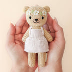 Tiny Olivia the honey bear, gives 10 meals