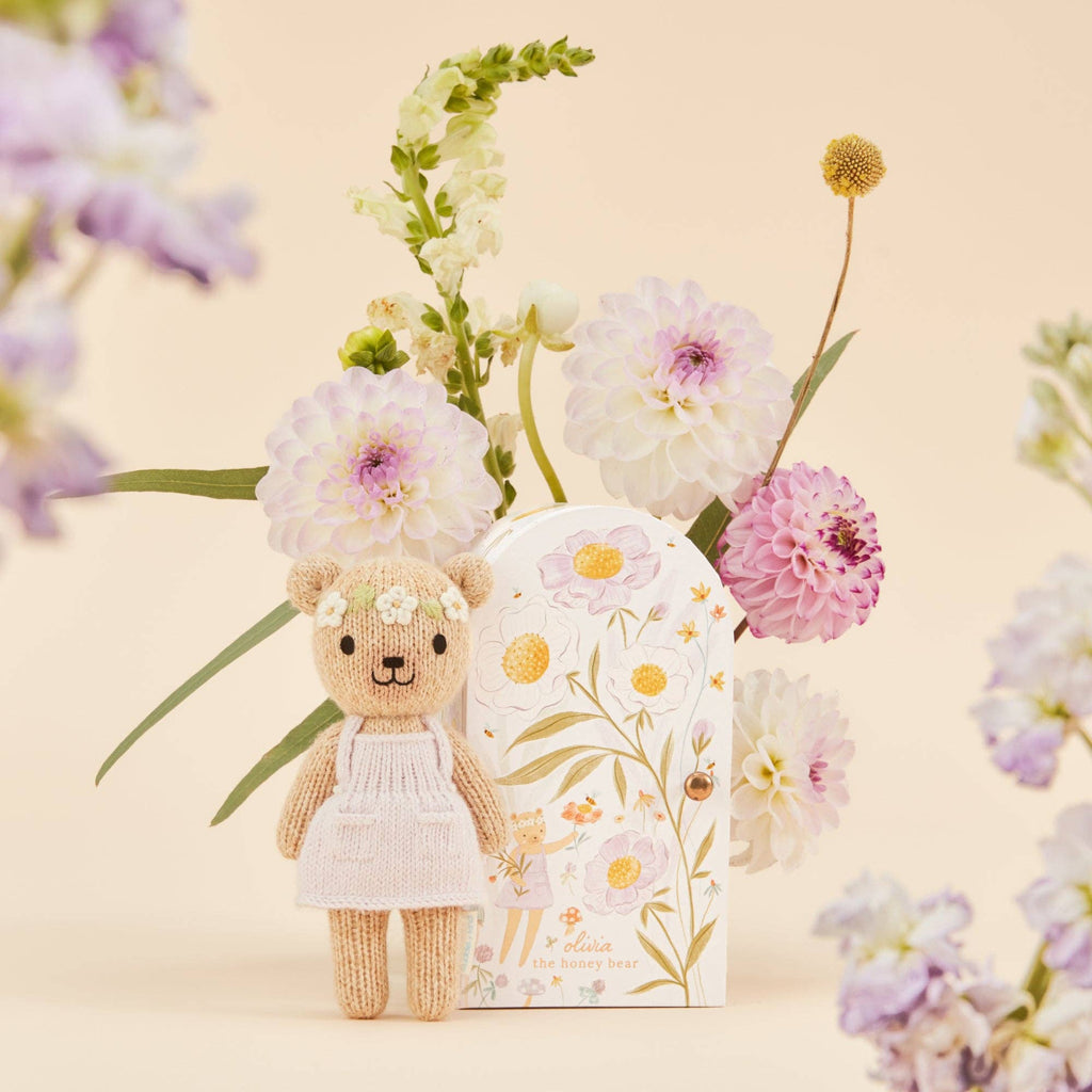 Tiny Olivia the honey bear, gives 10 meals