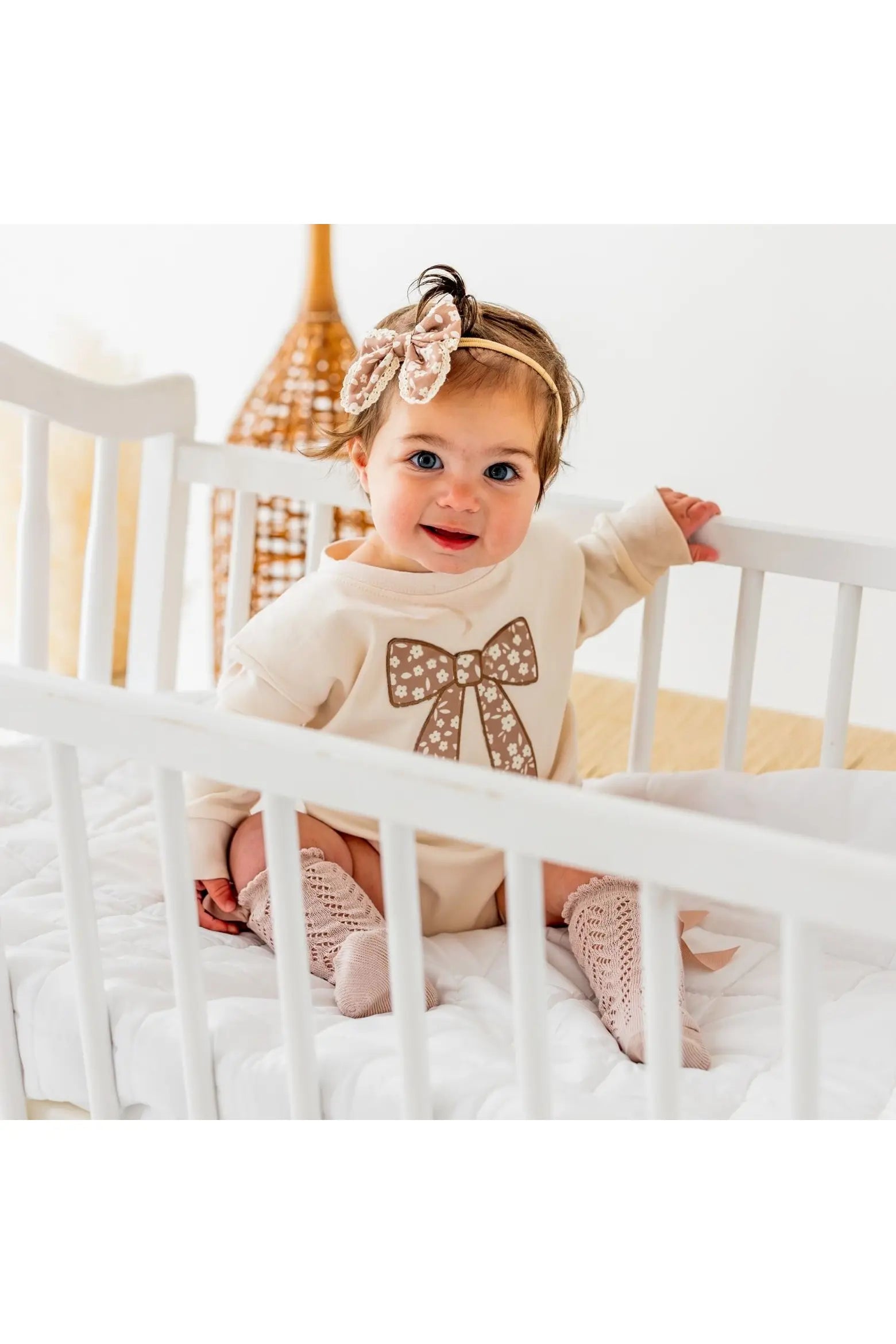 Mocha Floral Bow Patch Long Sleeve Romper