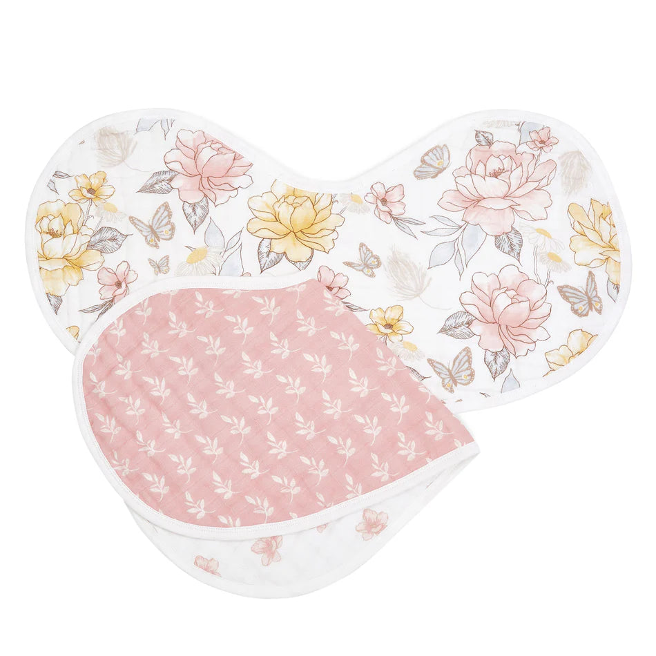 Earthly 2-pack Organic Burpy Bibs featuring soft organic muslin fabric with floral and butterfly patterns, designed for gentle baby feeding and burping protection.