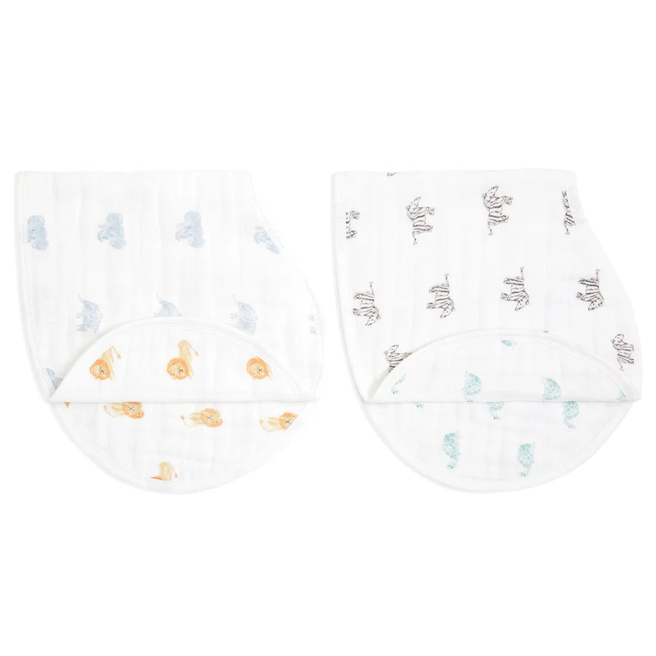 Animal Kingdom 2-pack Burpy Bibs featuring soft muslin fabric with playful animal prints in pastel blue, orange, and brown designed for baby feeding and drool protection.